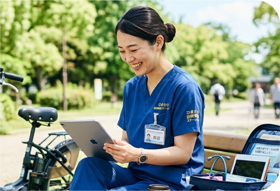 タブレットで記録をつける訪問看護師